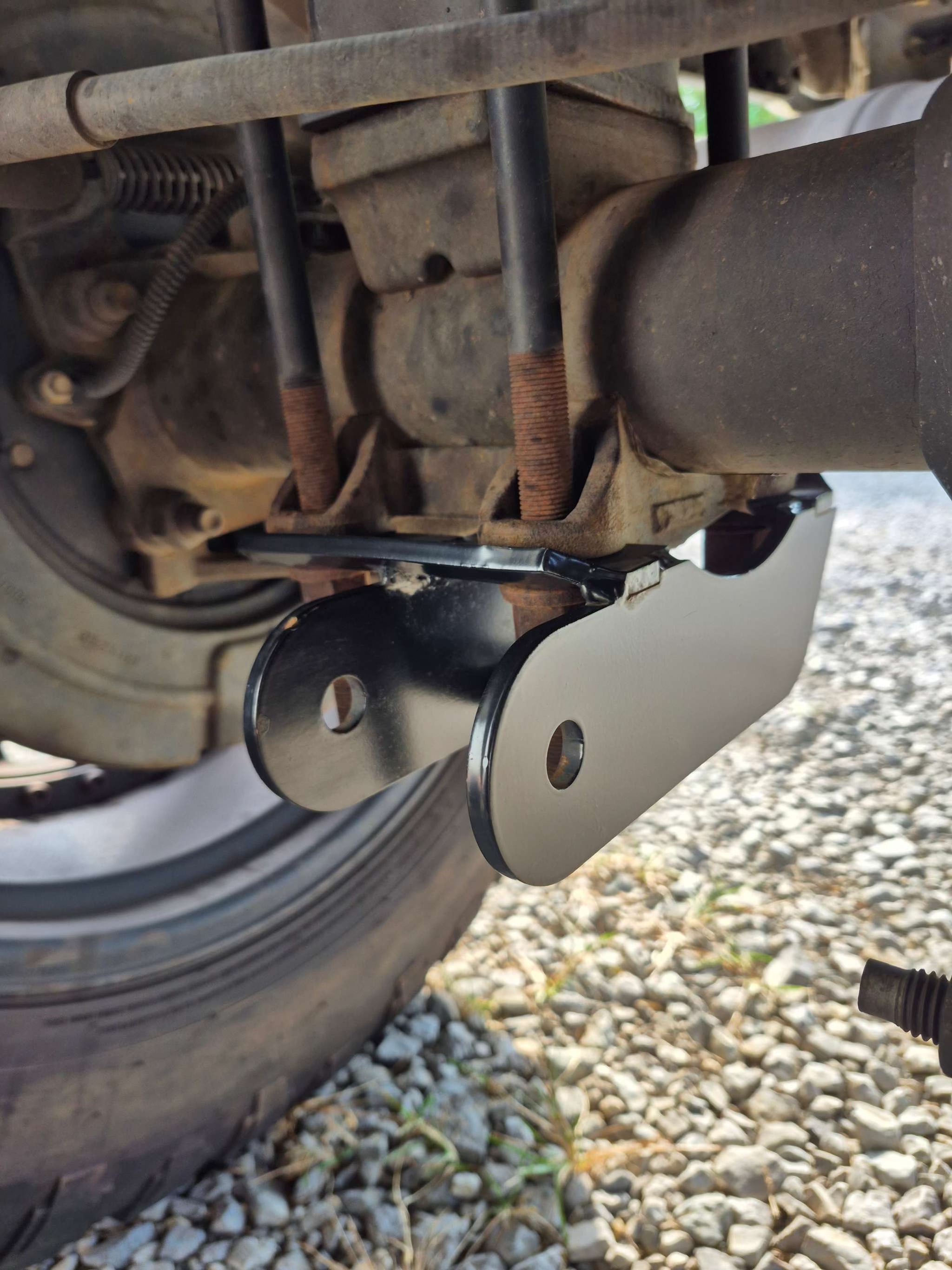 Chevrolet Silverado 1500 ladder traction bars for 2014-2019 models bolted on rear axle stability bars