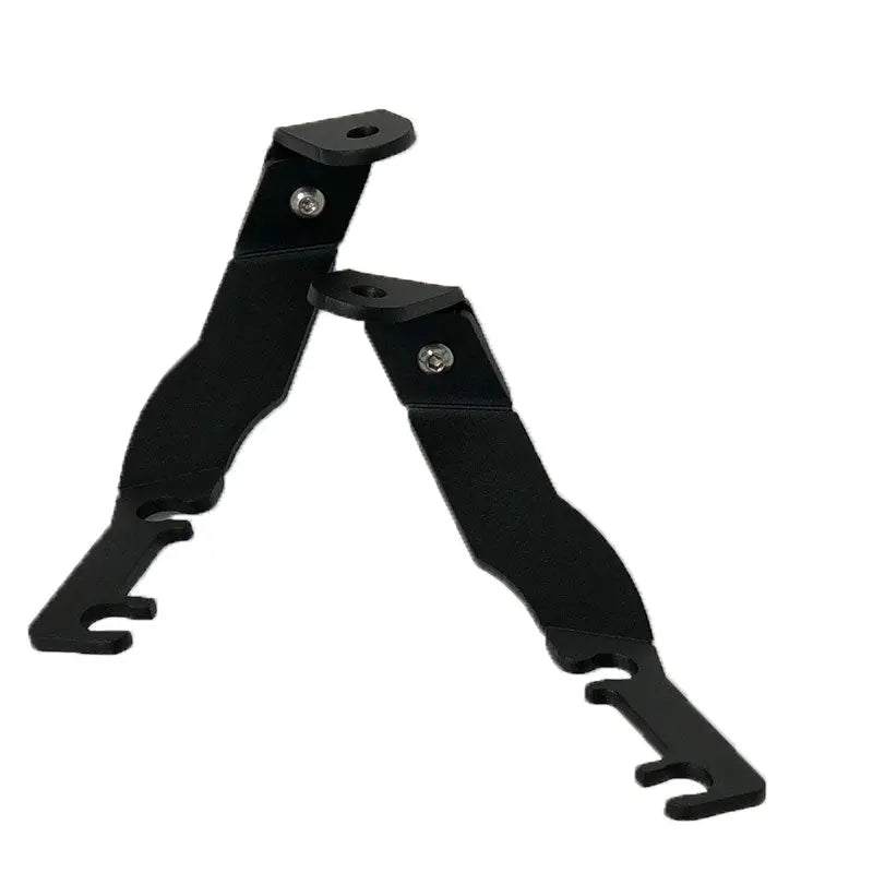 1995-2004 Toyota Tacoma hood ditch light mounts bolt-on black steel brackets installed on truck hood hinges
