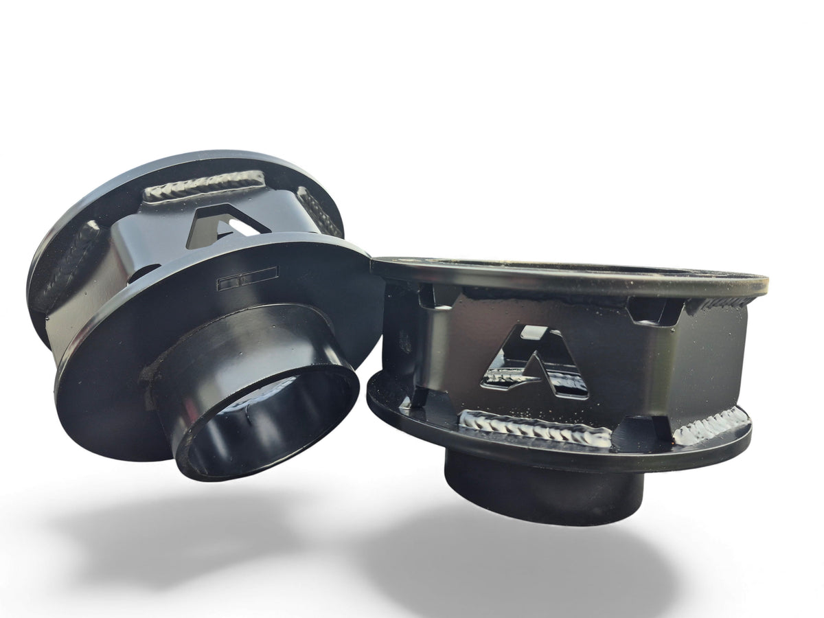 Dodge Ram 2500/3500 black steel coil spring leveling kit spacers with welded reinforcement brackets and bolt-on design