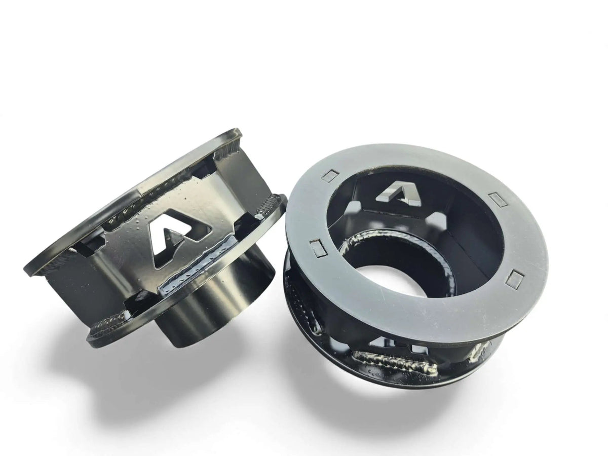 2014-2026 Ram 2500 and Ram 3500 leveling kit installed — APOC Industries front coil spacers and radius arm drop brackets